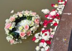 Floral wreath prepared for a cremation and ash repatriation service